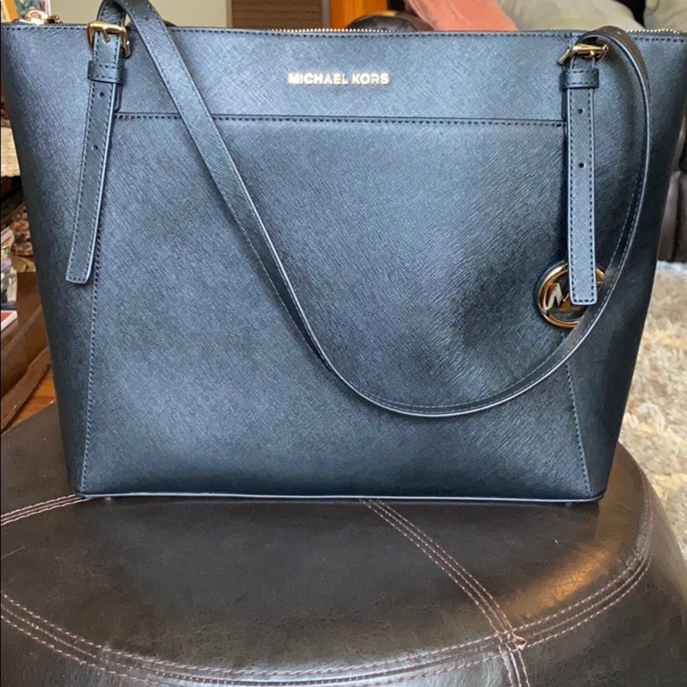 Michael Kors only used once